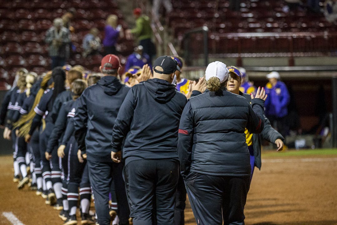 South Carolina and LSU players and coaching staff congratulate each other after their second matchup at Beckham Field on March 13, 2023. The Tigers defeated the Gamecocks 5-1 in the final game, clinching the series win.