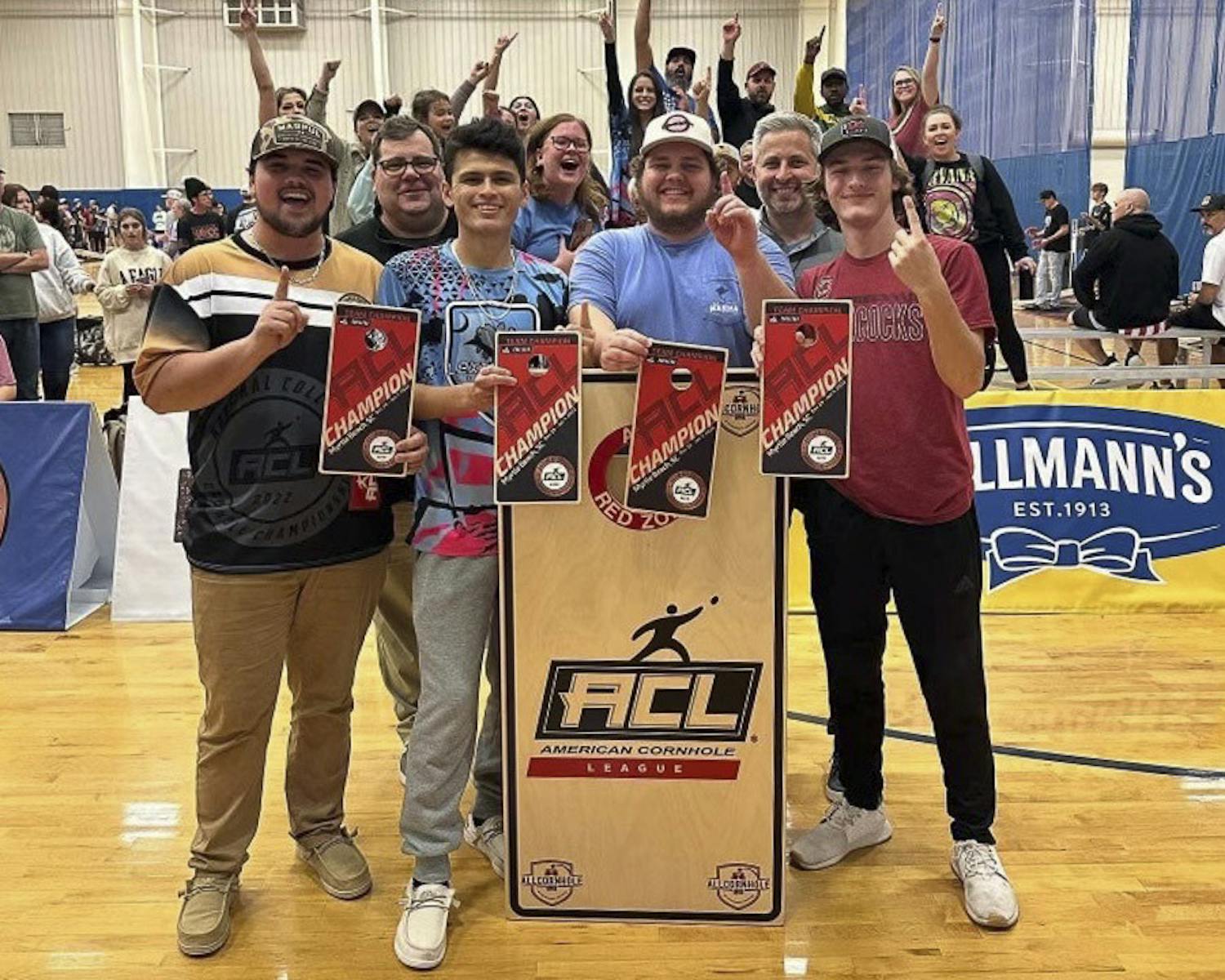 Left to right: Fourth-year operations and supply chain student Diego Franklin, third-year sport and entertainment management student Angel Camarena, 2022 mechanical engineering graduate Avery Snipes and first-year sport and entertainment management student Nolan Cochran pose after winning the National College Cornhole Championship team event on Dec. 31, 2022. The Gamecocks earned a 5-1 match record and a 13-5 mark in individual games en route to the title.