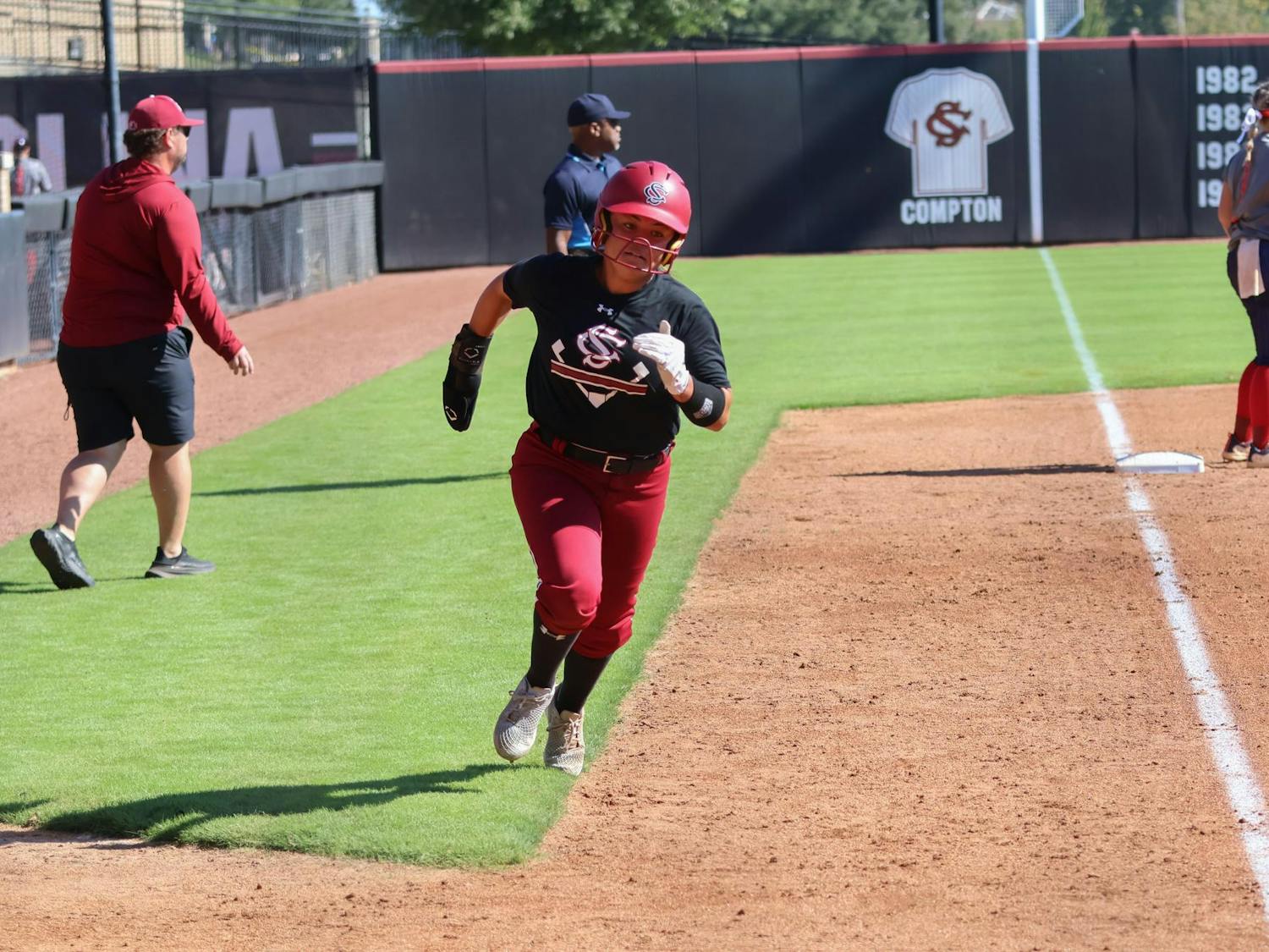 Freshman pitcher Olivia Kotowski runs home to secure another run during South Carolina's game against USC Aiken on Oct. 12, 2024. The run helped the Gamecocks win against their in-state competition.