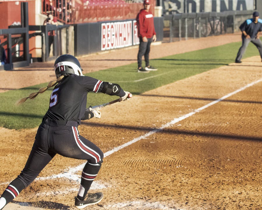 Junior outfielder Carlie Henderson goes in to bunt the ball during the matchup between South Carolina and George Washington University at Beckham Field on Feb. 18, 2023. The Gamecocks beat the Colonials 7-1. 