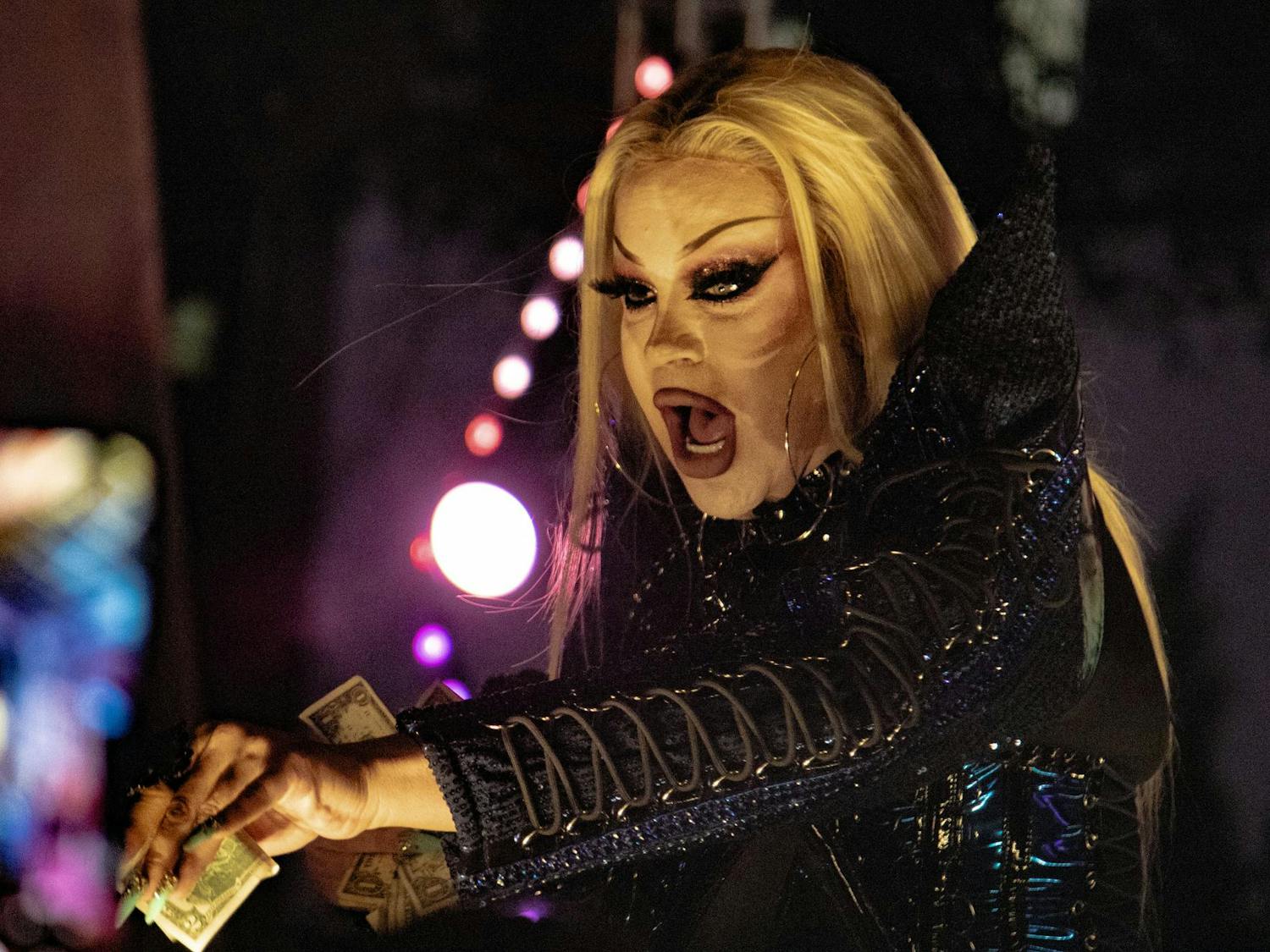 Drag performer Shannel is handing tips from audience members as they preform at South Carolina Pride on Oct. 19. 2024. Shannel, along with other drag queens from Rupaul's Drag Race, also preformed.