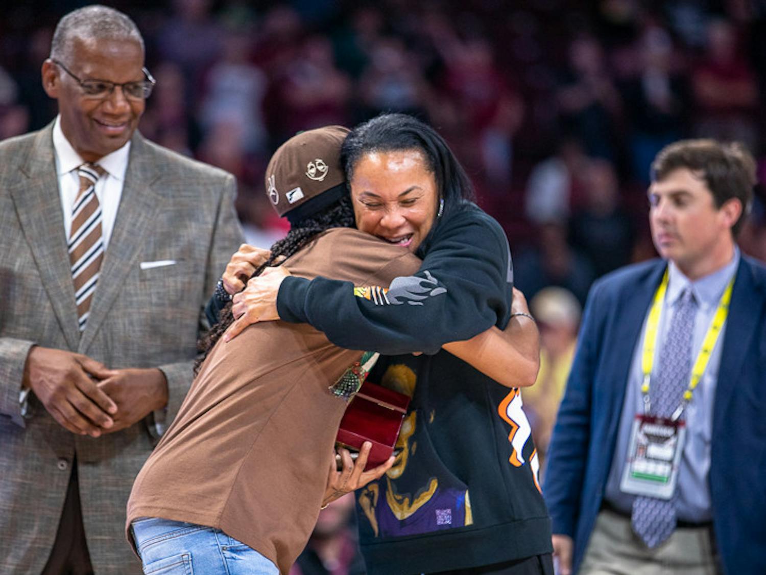 Head coach Dawn Staley (right) and former Gamecock guard Destanni Henderson (left) embrace each other during the ring ceremony. Henderson now plays in the WNBA for the Indiana Fever.&nbsp;