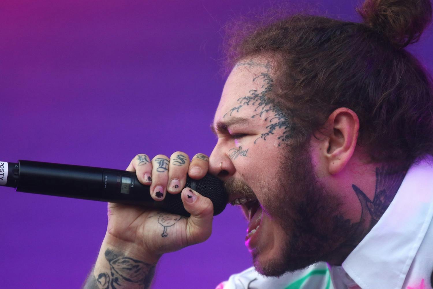 Post Malone performs on the Bud Light Stage during the Lollapalooza festival on Aug. 3, 2018, in Chicago.