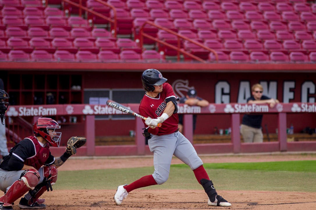 Sixth-year infielder Will McGillis hits a ball into the outfield during the second inning of the Garnet and Black scrimmage on Nov. 5, 2022. Will McGillis, one of South Carolina's newest transfer portal recruits, aims to earn a starting position for the Gamecocks after starting 58 games last season at Southern Miss.