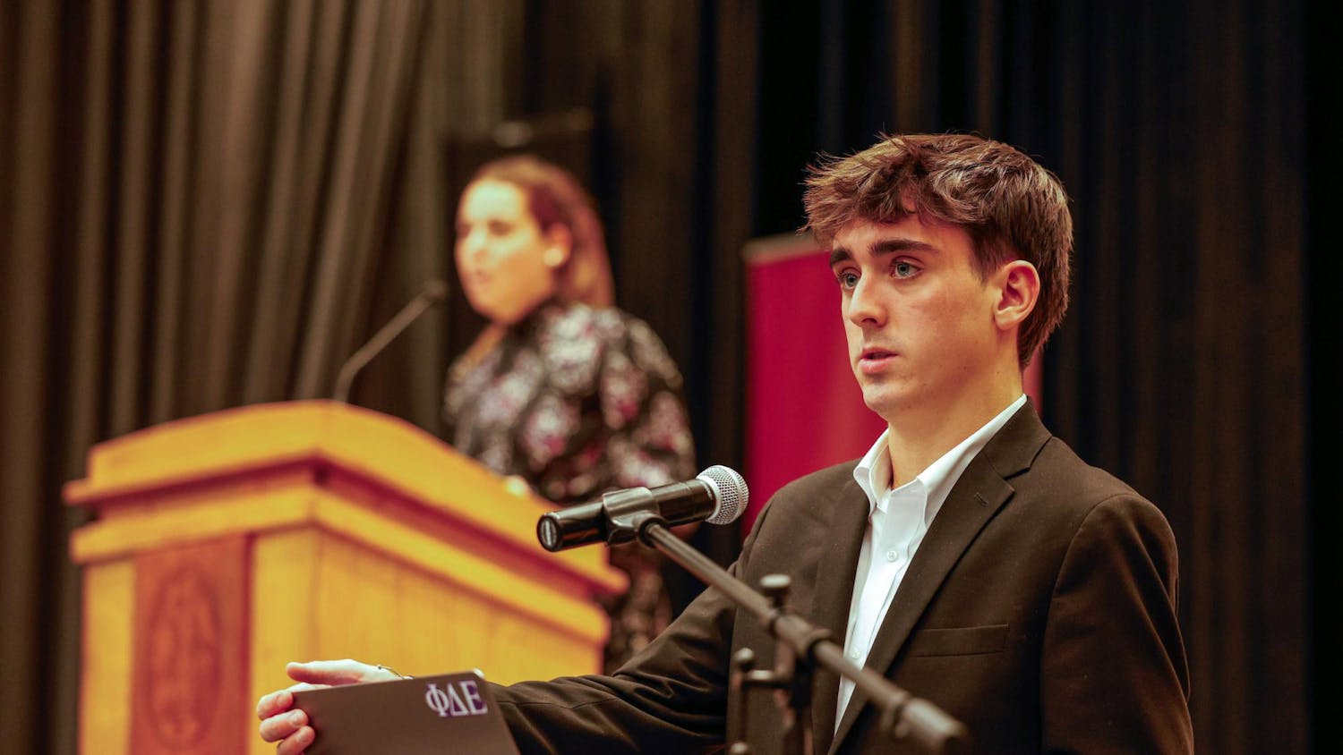 Third year pre-medical public health student and Senator William Barnes speaks during a student senate meeting at the Russell House Theater on Oct. 23, 2024. Barnes represents the Arnold School of Public Health and serves as Chairman of the Student Life Committee.