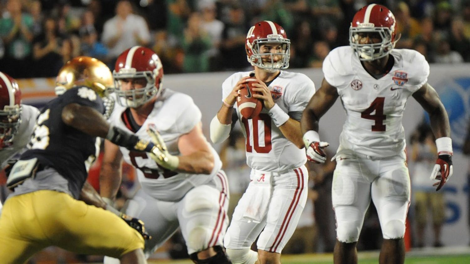 AJ McCarron of Alabama drops back to pass against Notre Dame during the BCS National Championship game at Sun Life Stadium in Miami Gardens, Florida, on Monday, January 7, 2013. (Jim Rassol/Sun Sentinel/MCT)