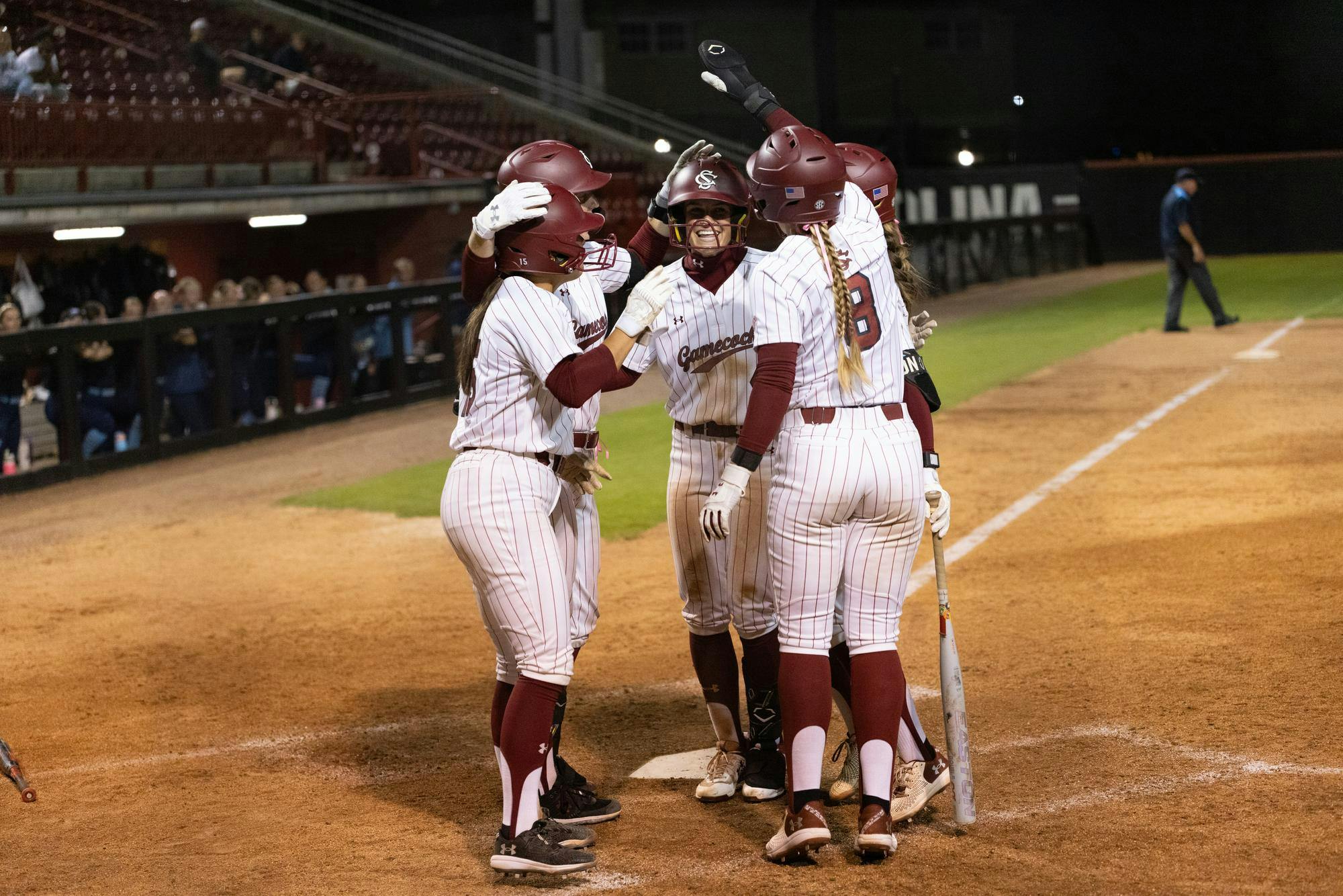 Junior utility Tori Ensley celebrates with the team after hitting a home run in the women's softball game against USC Beaufort on Oct. 25, 2025. Ensley played center field in the first game, then played left field for the start of the second.