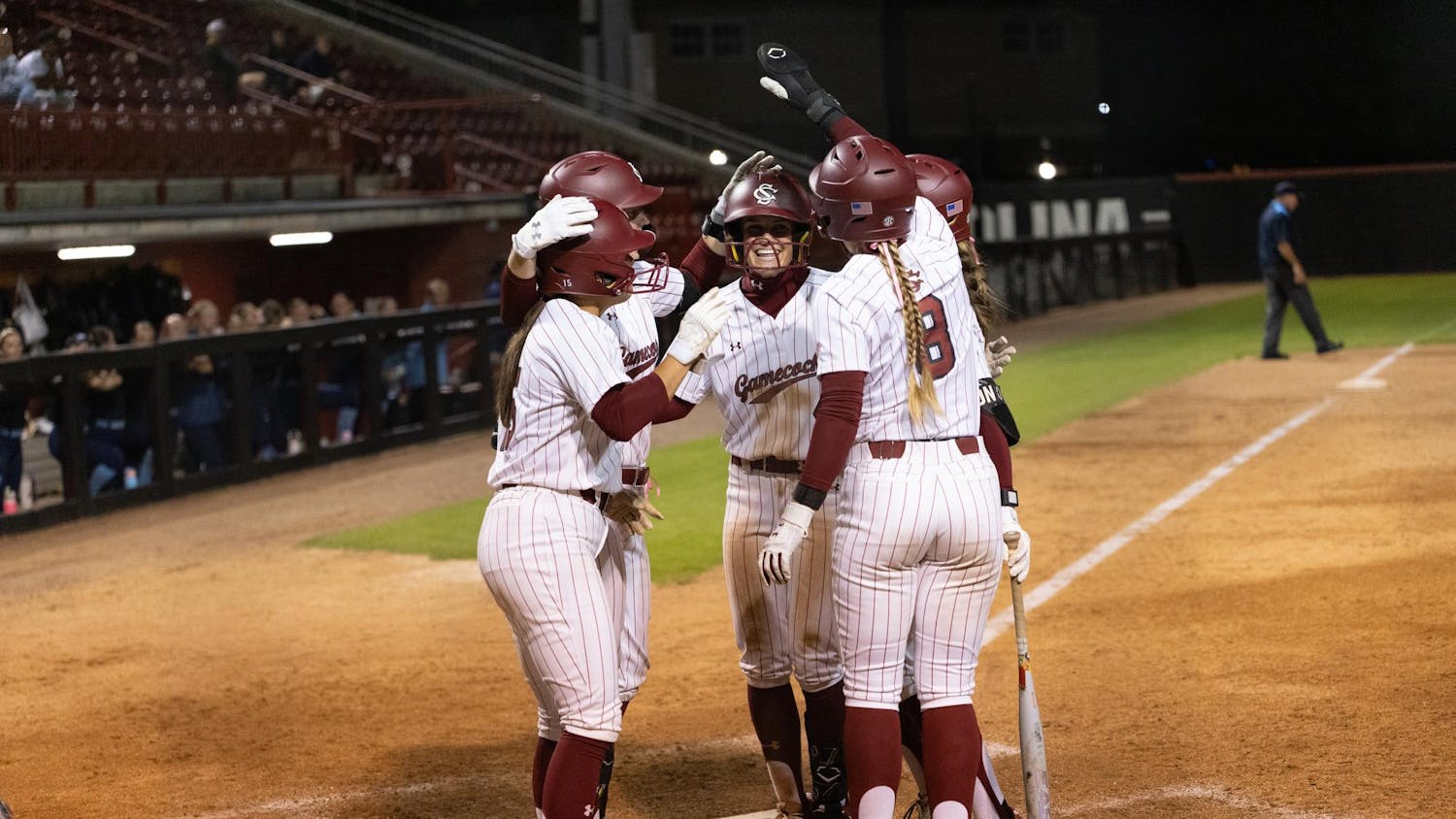 Junior utility Tori Ensley celebrates with the team after hitting a home run in the women's softball game against USC Beaufort on Oct. 25, 2025. Ensley played center field in the first game, then played left field for the start of the second.