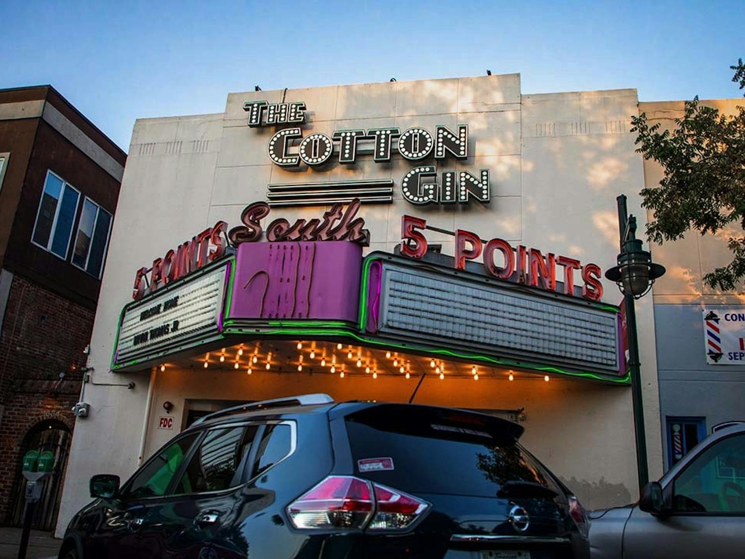 The street view of the Cotton Gin, in the early evening when it would normally be bustling with college students at this hour. The Cotton Gin is one of several bars in 5 points that has experienced a shift in demographics of customers after legislation passed that sought to limit underage drinking and general chaos in the area. 