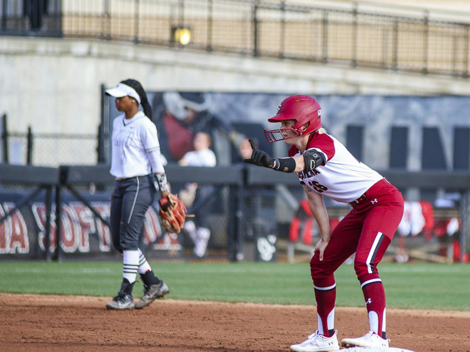 Junior infielder Riley Blampied signals to her teammates during the match against Western Kentucky University at Beckham Field on Feb.19, 2023. The Gamecocks defeated the Hilltoppers 11-2.&nbsp;