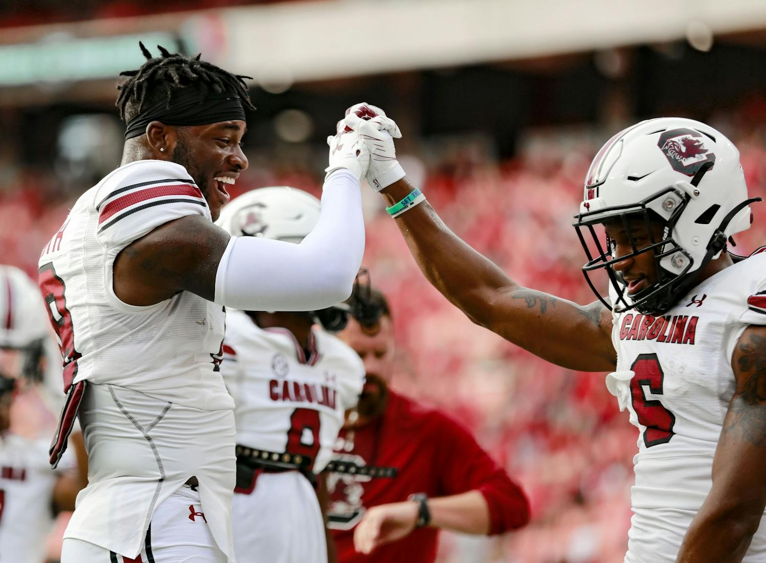 Redshirt sophomore defensive back Cam Smith and fifth-year wide receiver Josh Vann have fun before South Carolina's game against Georgia on Sept. 18, 2021.