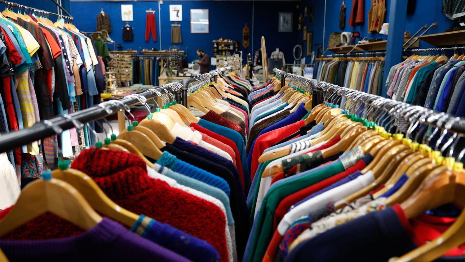 Various clothes hang on racks at Pannerpete Vintage on Dec. 4, 2024. The store features various second-hand vintage clothing.
