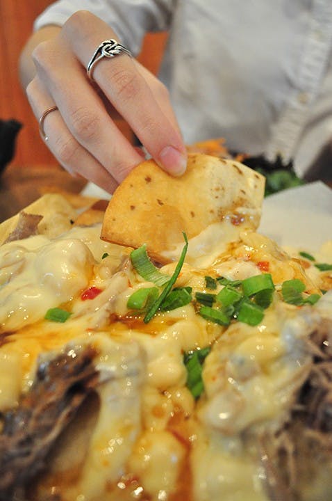 	Duck nachos with a sweet chili gruyere sauce