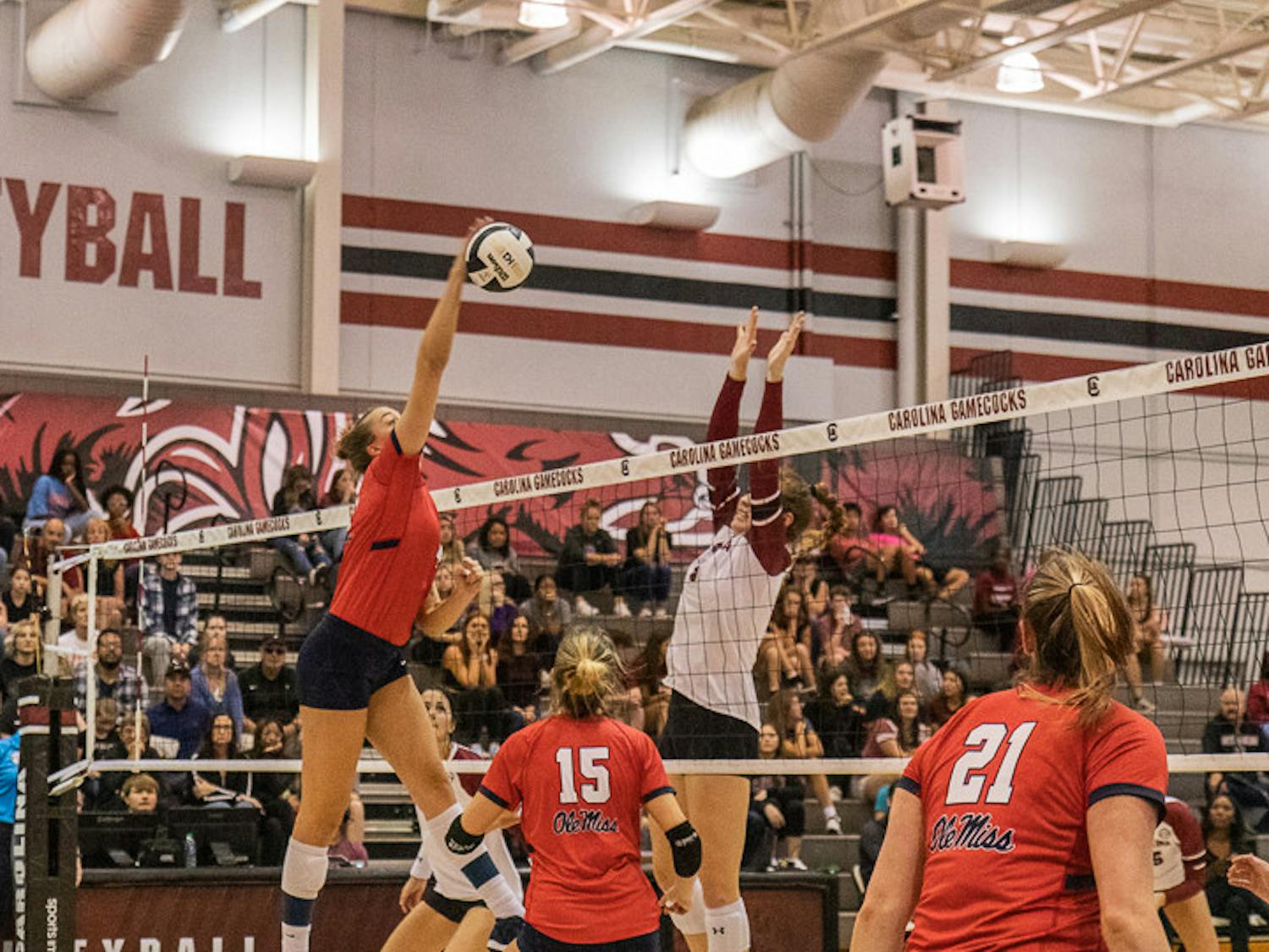 Ole Miss junior middle blocker Payton Brgoch spikes the ball over the net during the matchup against South Carolina on Nov. 5, 2022. The Rebels scored 64 kills, while the Gamecocks scored 59.&nbsp;