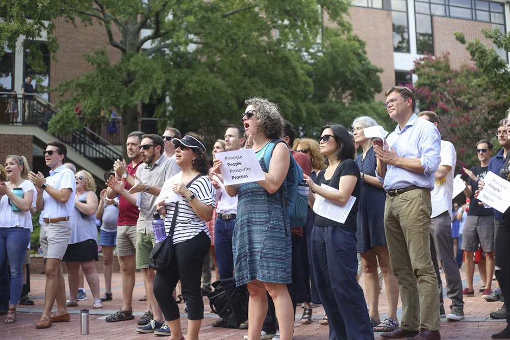 Students and faculty cheer during the "Gamecocks4Integrity" rally on Wednesday at Russell House.&nbsp;