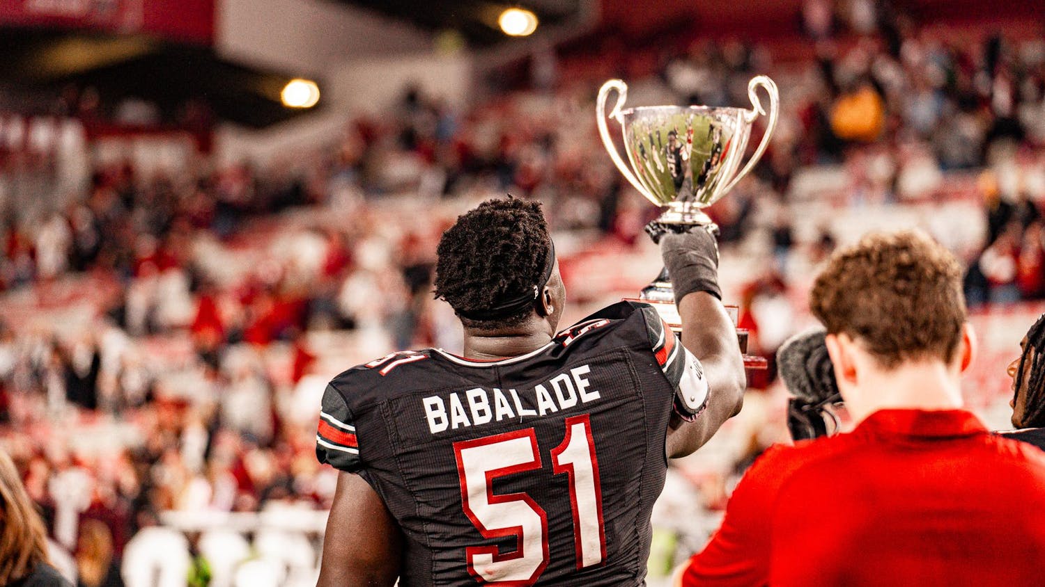 FILE — Then-sophomore offensive lineman Tree Babalade celebrates South Carolina's win against the Mizzou Tigers on Nov. 16, 2024 at Williams-Brice Stadium. The Gamecocks will open the 2025 season against Virginia Tech on Aug. 31, 2025 at Mercedes-Benz Stadium in Atlanta, GA.