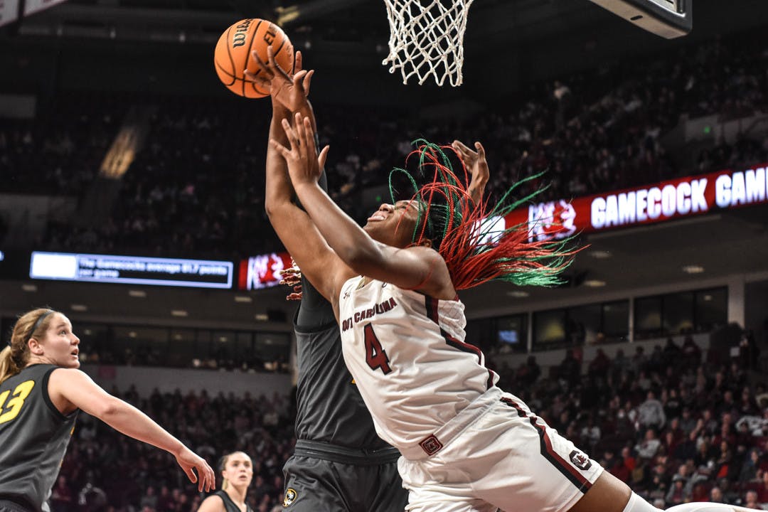 Senior forward Aliyah Boston blocks a Missouri shot during the game on Jan. 15, 2023. Boston scored 20 points and had 10 rebounds in the 81-50 win over the Tigers.&nbsp;