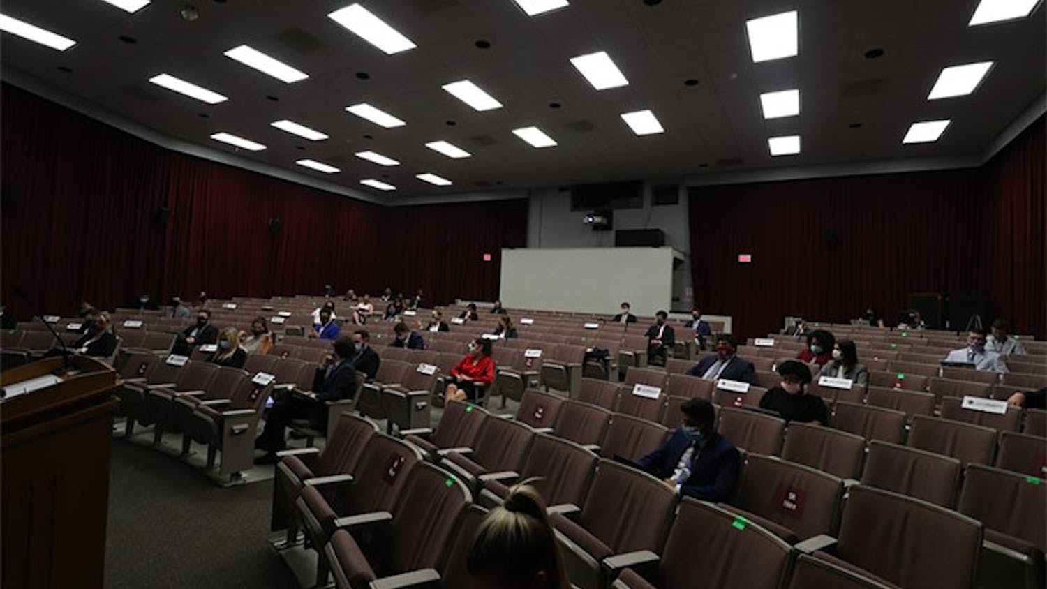 Student senate is held in the Russell House Theater. The chairs within the theater are marked to follow campus guidelines regarding COVID-19.