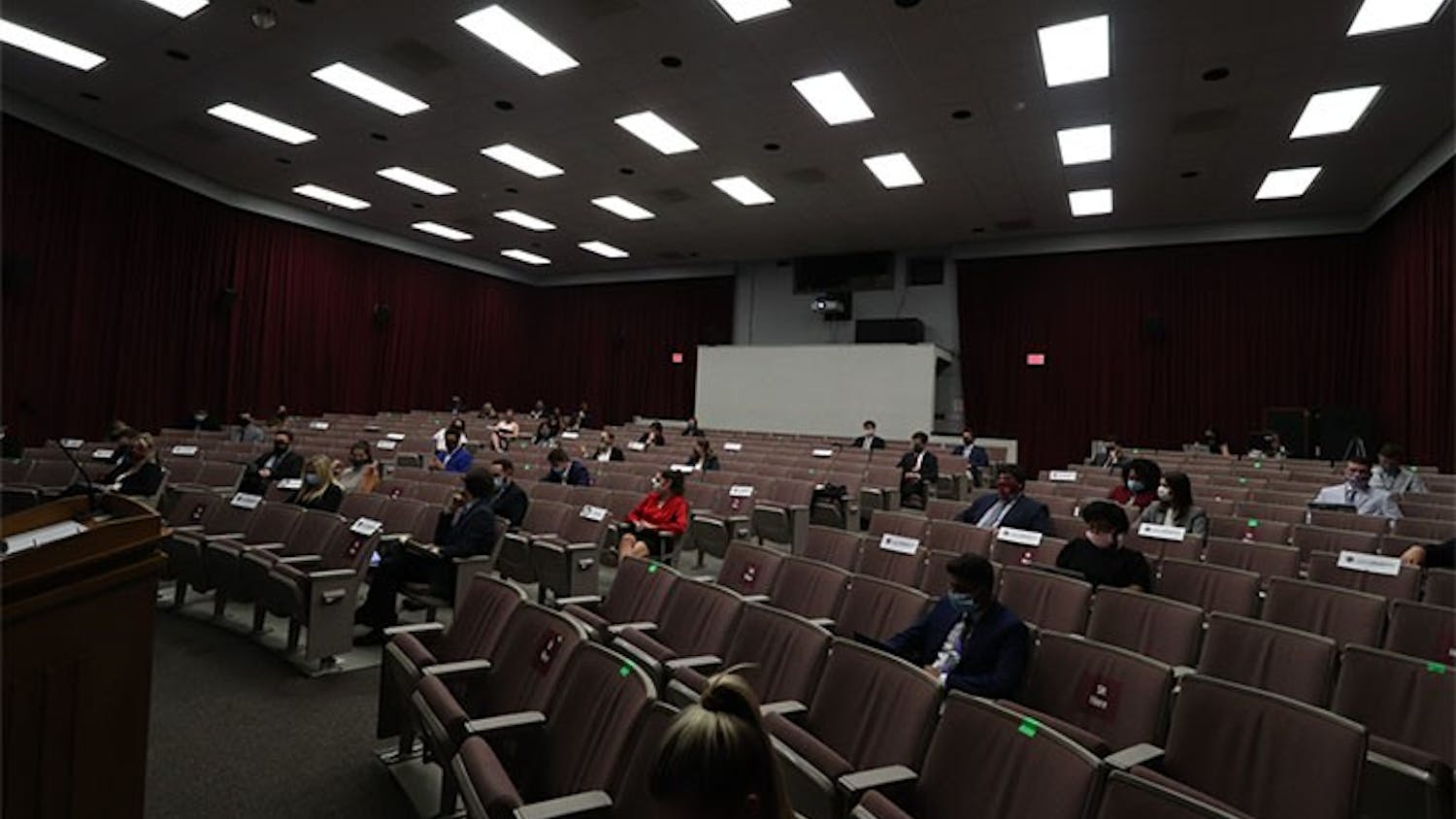 Student senate is held in the Russell House Theater. The chairs within the theater are marked to follow campus guidelines regarding COVID-19.
