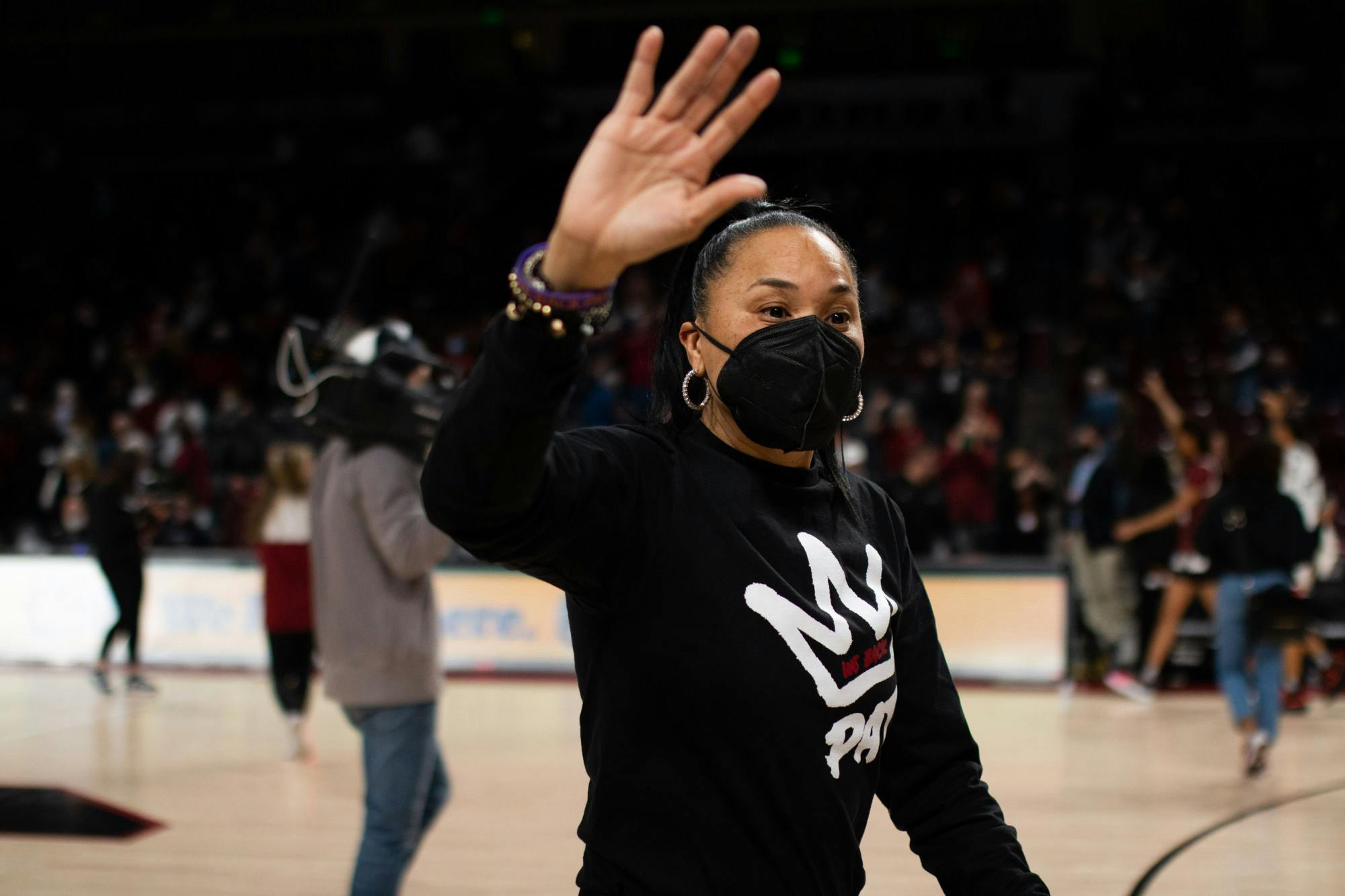 FILE— Coach Dawn Staley waves to fans as she leaves the court following a game against Vanderbilt at Colonial Life Arena on Jan. 24, 2022.