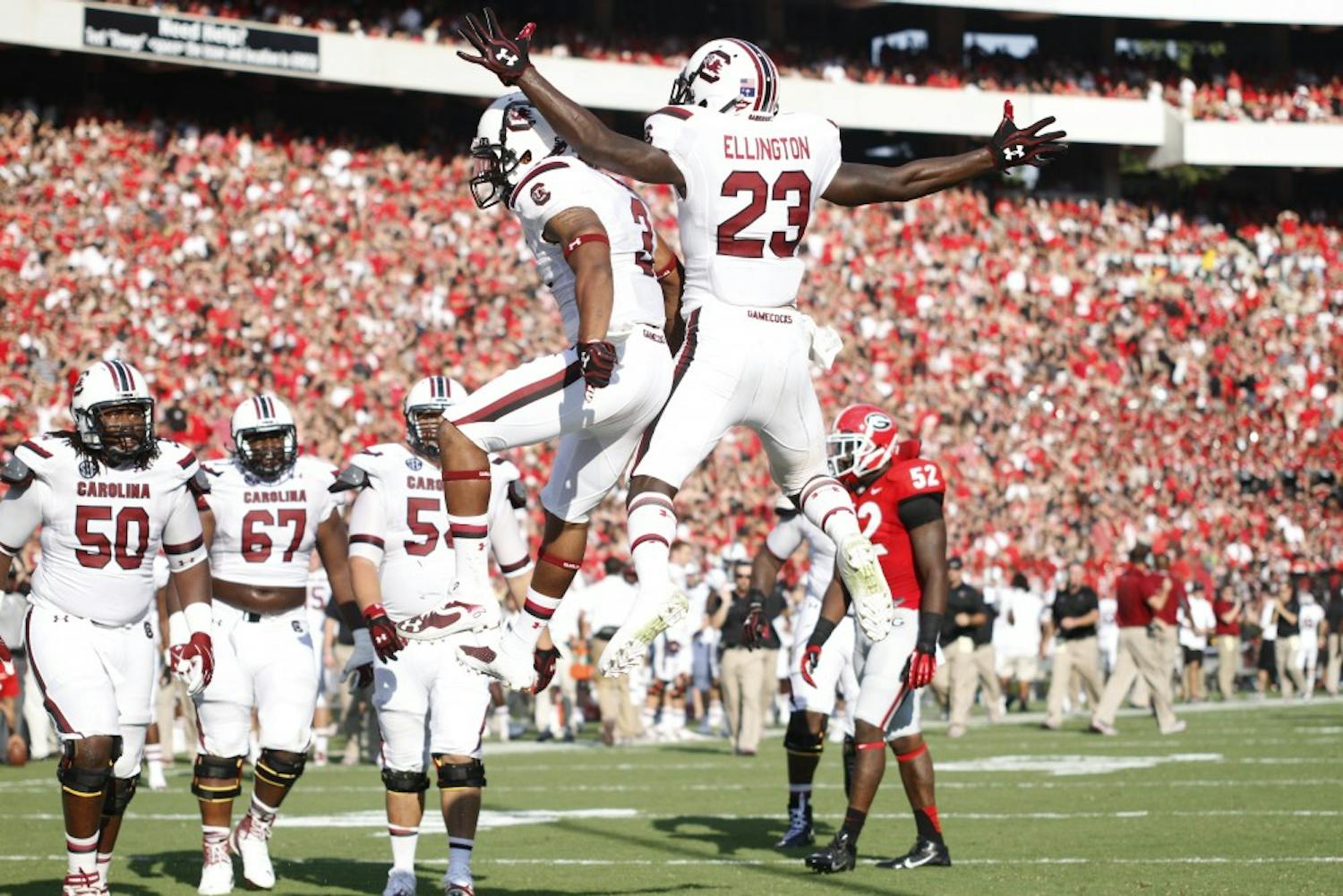 	Nick Jones and Bruce Ellington celebrate after one of Jones&#8217; two touchdown receptions.