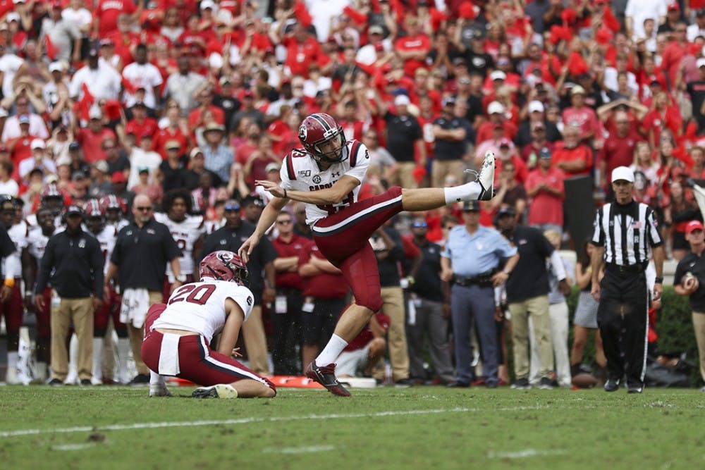 Junior place-kicker Parker White kicks a field goal in the game against UGA.