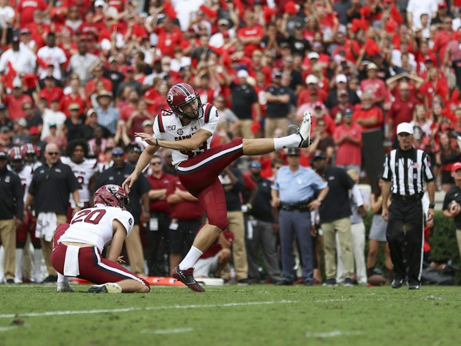 Junior place-kicker Parker White kicks a field goal in the game against UGA.