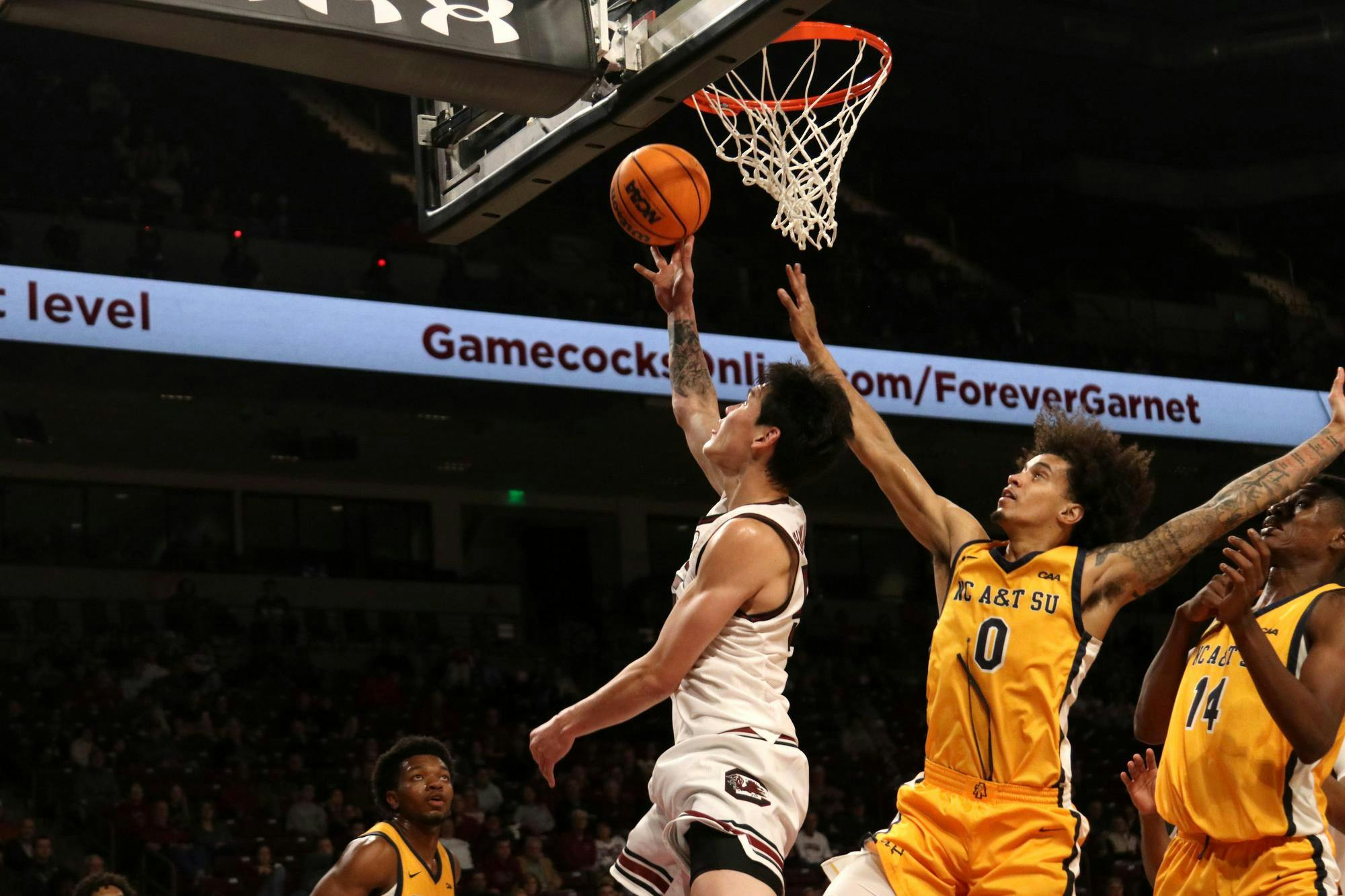 Senior guard Mike Sharavjamts lays the ball up to the basket during South Carolina's season opener against North Carolina A&amp;T at Colonial Life Arena on Nov. 4, 2025. The Gamecocks won 91-72 and improve to 1-0 on the season.
