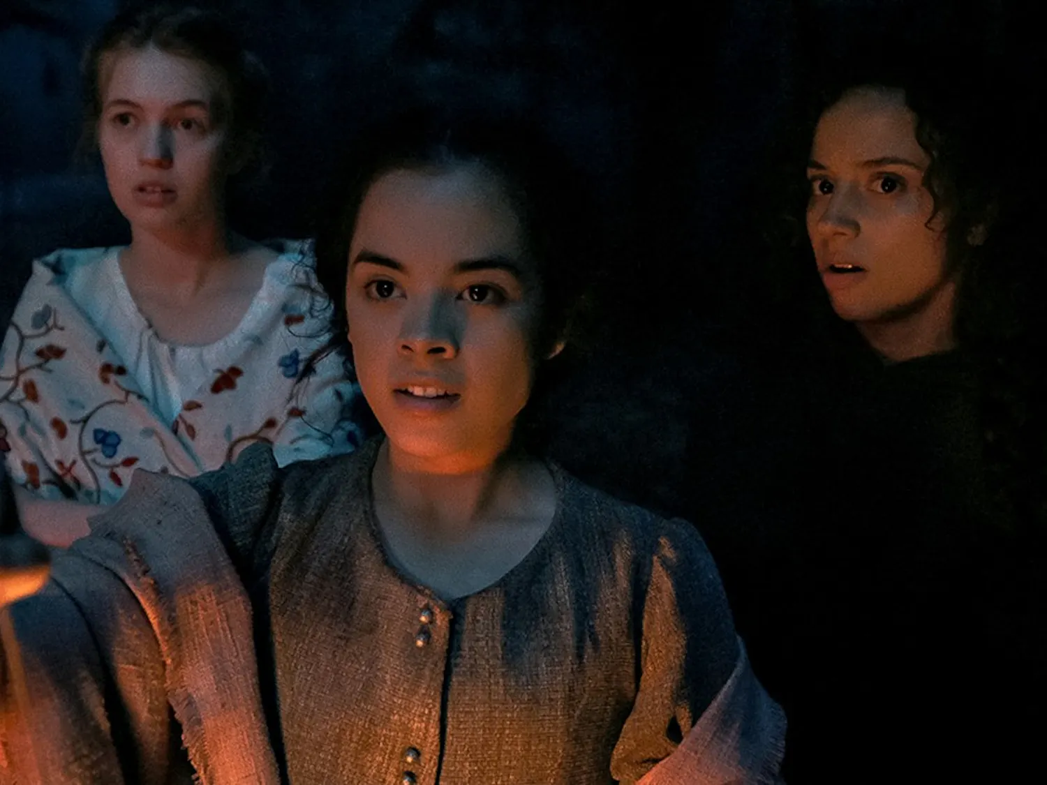 From left to right: Julia Rehwald, Olivia Scott Welch and Kiana Madeira in "Fear Street: Part 3 — 1666." (Netflix/TNS)