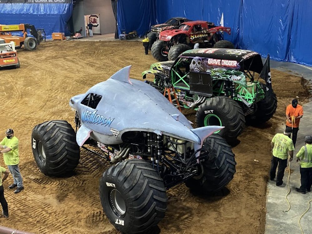 A row of monster trucks sit inside of Colonial Life Arena during Monster Jam's visit to Columbia.