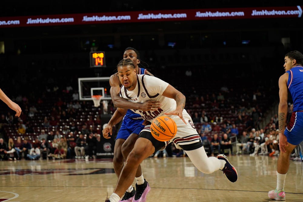 <p>Junior forward Elijah Strong gets pressured by a Presbyterian College defender in the Gamecocks matchup against Presbyterian College Colonial Life Arena on Nov. 12, 2025. Strong grabbed four rebounds in this game.</p>