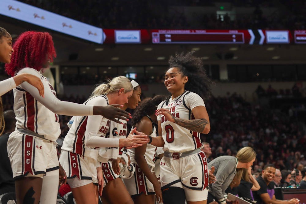 <p>Senior Guard Te-Hina Paopao comes off the court and is congratulated by fellow teammates during the Oklahoma game on Jan. 19, 2025. The 101-60 score makes the Gamecocks 5–0 against SEC opponents.</p>