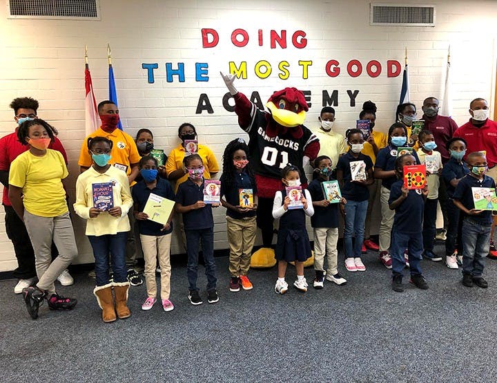 Cocky’s Reading Express takes University of South Carolina student volunteers to Title One elementary schools throughout the state to promote the importance of literacy and life-long reading. Every child who makes a promise to Cocky to read every day receives a brand-new book to take home.