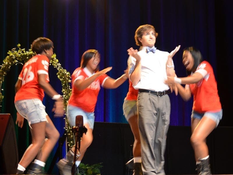 During the talent part of the competition, Chase Mizzell (second from left) performs a dance.