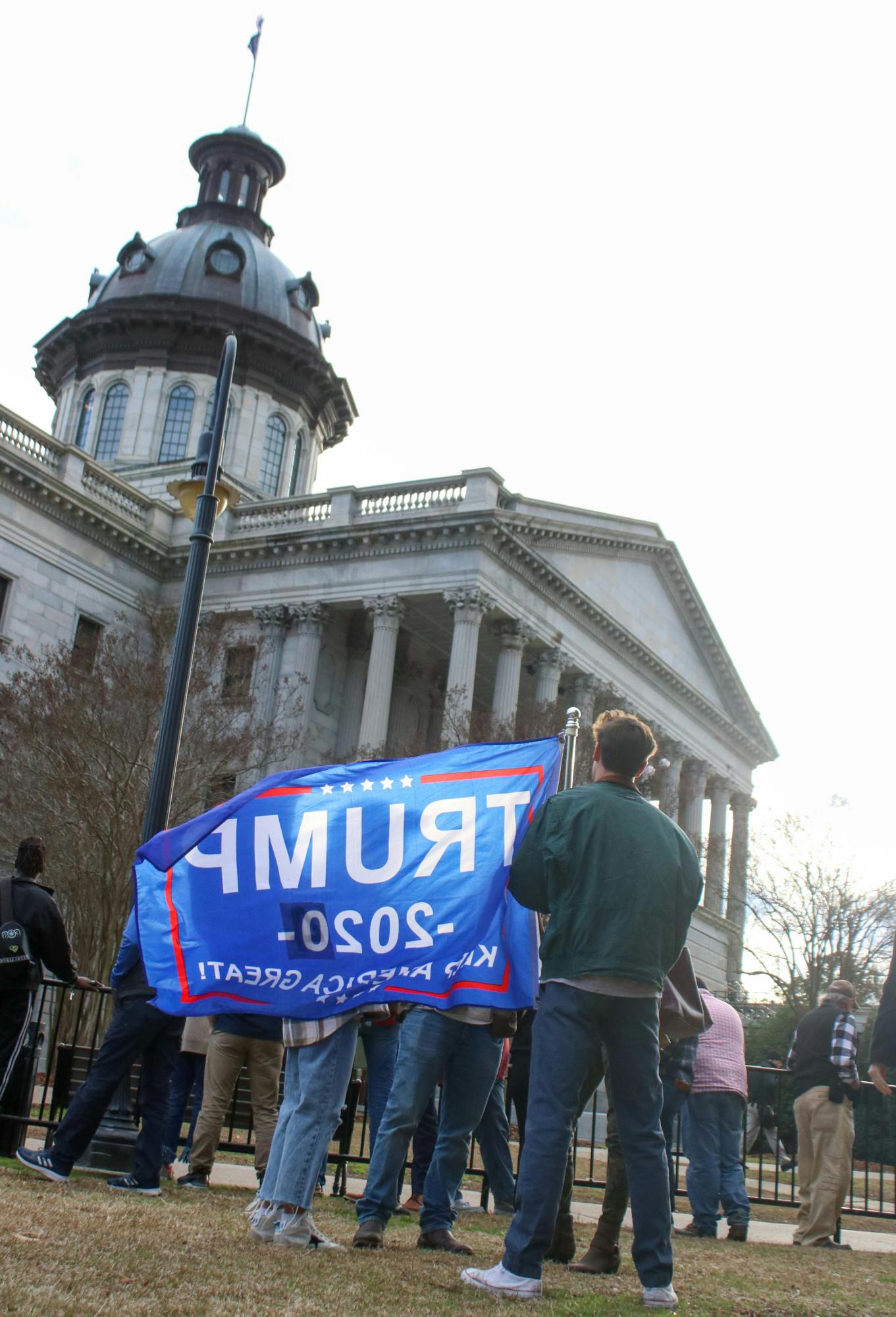 While hundreds of people made it into the Statehouse for former President Donald Trump's private campaign event, many remained gathered on the lawn on Jan. 28, 2023. Chants of "U-S-A" could be heard at different times of the day, as some attendees demonstrated their support for Trump's 2024 campaign.&nbsp;