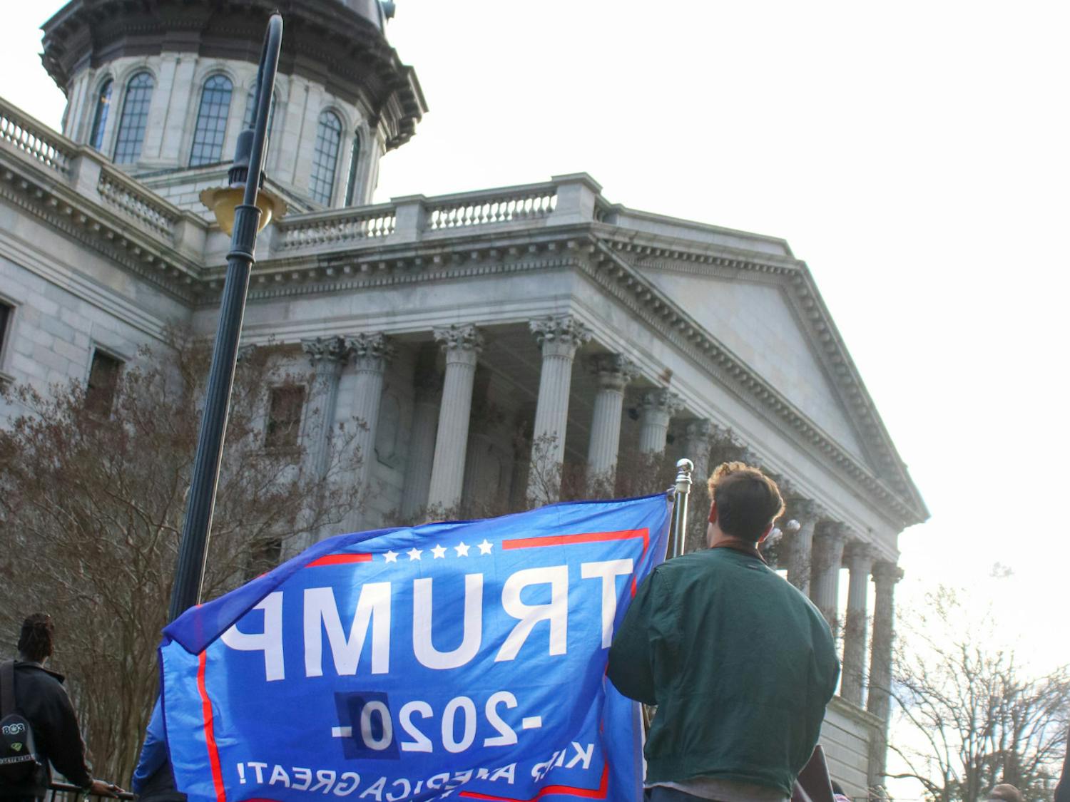 While hundreds of people made it into the Statehouse for former President Donald Trump's private campaign event, many remained gathered on the lawn on Jan. 28, 2023. Chants of "U-S-A" could be heard at different times of the day, as some attendees demonstrated their support for Trump's 2024 campaign.&nbsp;