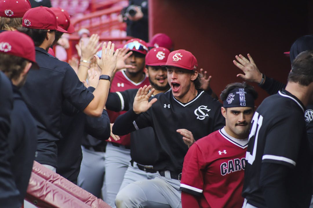 Players from team Black hype each other up after scoring the winning run during its first scrimmage of the 2023 season against team Garnet on Jan. 27. South Carolina baseball will start its 2023 season on Feb. 17 against the University of Massachusetts Lowell.