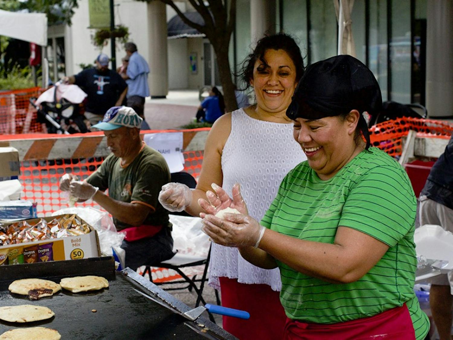 Vendors make authentic food at the annual Main Street Latin Festival in 2016.