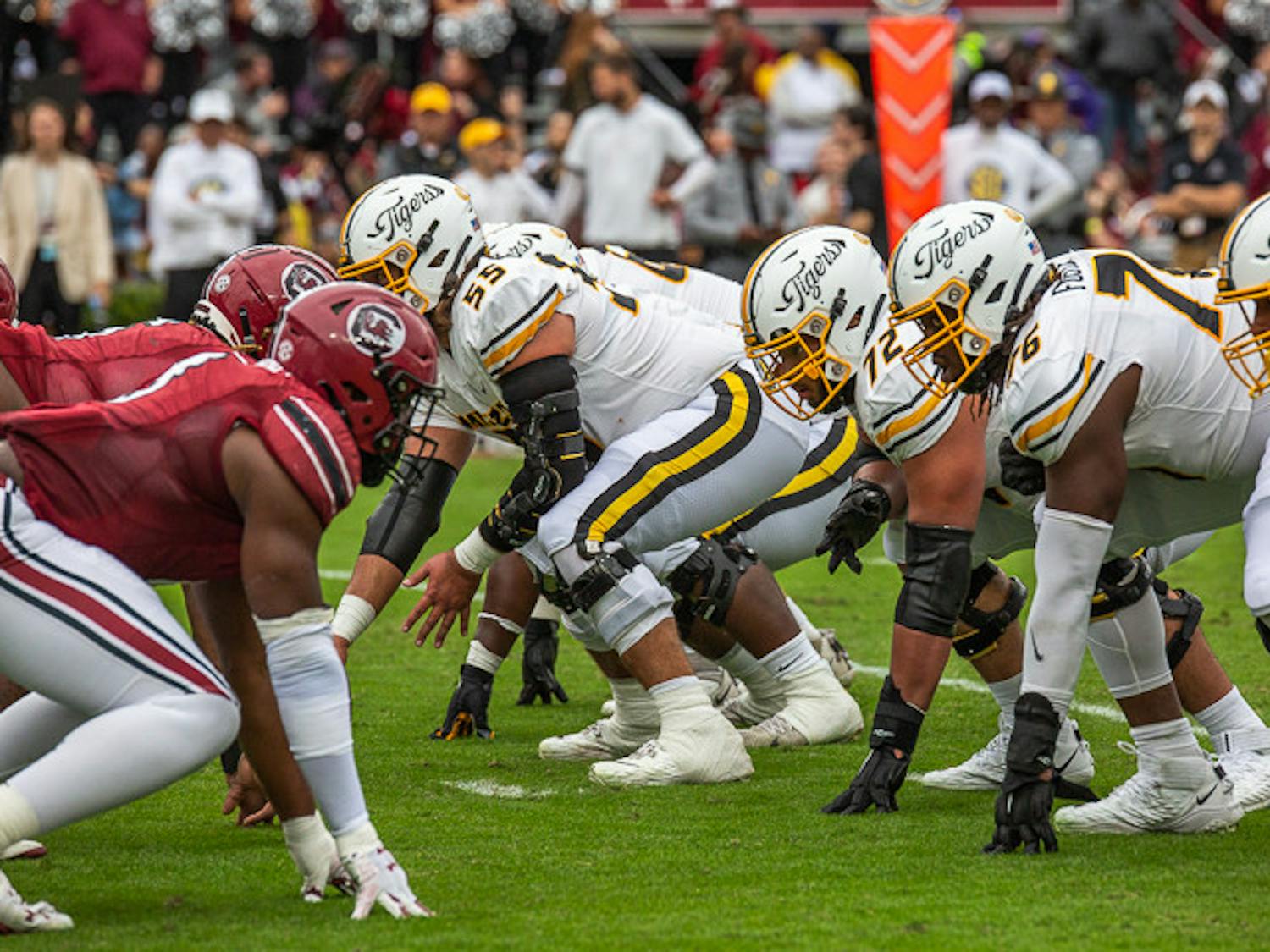 The Missouri offensive line getting into position opposite of the South Carolina defensive line before a play on Oct. 29, 2022. Missouri held a strong defense against the Gamecocks, only allowing the latter to push 203 yards in the game, while Missouri made a total of 367 yards.
