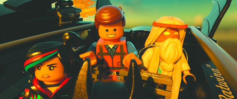 	Left to right: Wyldstyle (Elizabeth Banks), Emmet Brickowski (Chris Pratt) and Vitruvius (Morgan Freeman) satirize corporate America and blockbuster movies in this surprisingly subversive and funny movie based on a toy.