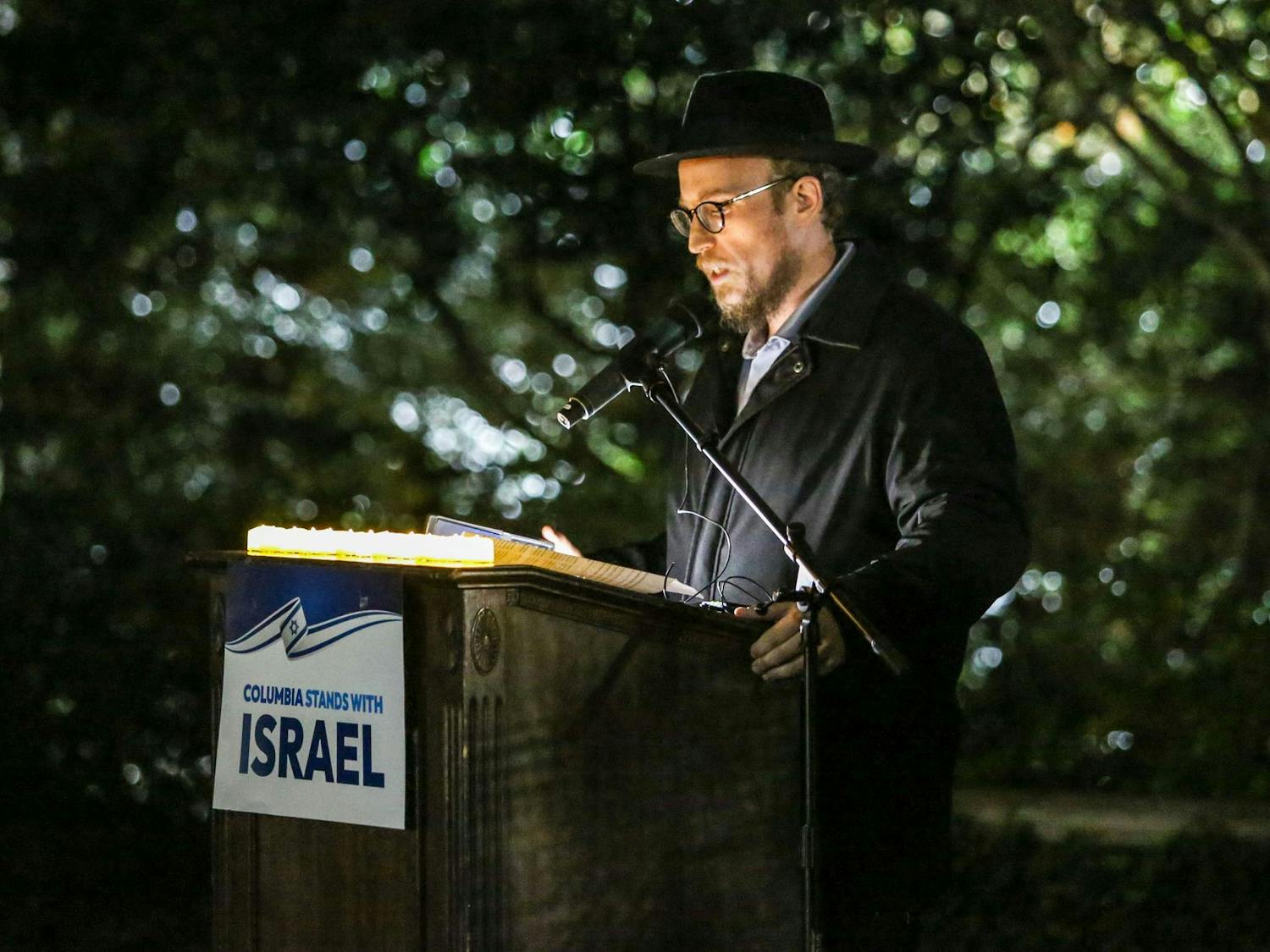A local Rabbi speaks during a Jewish community vigil in the garden of the Anne Frank Center at the University of South Carolina on Oct. 17, 2023. The vigil was hosted by Gamecocks for Israel, Hillel at UofSC, Alpha Epsilon Pi, Chabad on Campus and the University of South Carolina.