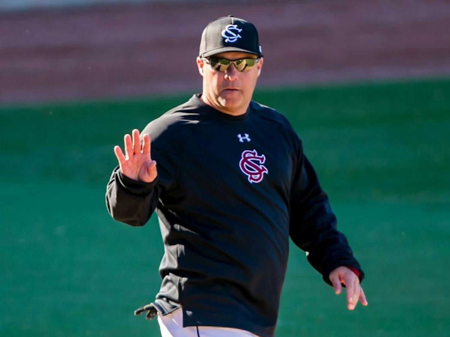 South Carolina head coach Chad Holbrook waves to fans following a 7-1 win against the College of Charleston at Carolina Stadium in Columbia, S.C., on Saturday, Feb. 14, 205. (Jeff Blake/The State/TNS)