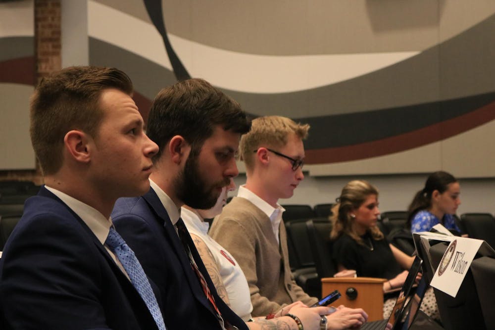 <p>FILE — Senators listen to the Student Government meeting on Feb. 18, 2026, at the Russell House Theater. A bill to simplify chapter one of the Student Government codes was passed by the senate.</p>