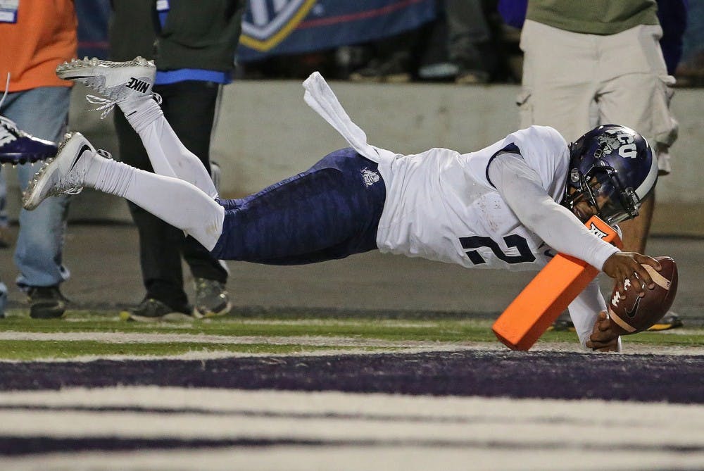 TCU quarterback Trevone Boykin (2) dives into the Kansas State end zone with a touchdown on a 14-yard run in the fourth quarter at Snyder Family Stadium in Manhattan, Kan., on Saturday, Oct. 10, 2015. TCU won, 52-45. (Paul Moseley/Fort Worth Star-Telegram/TNS)