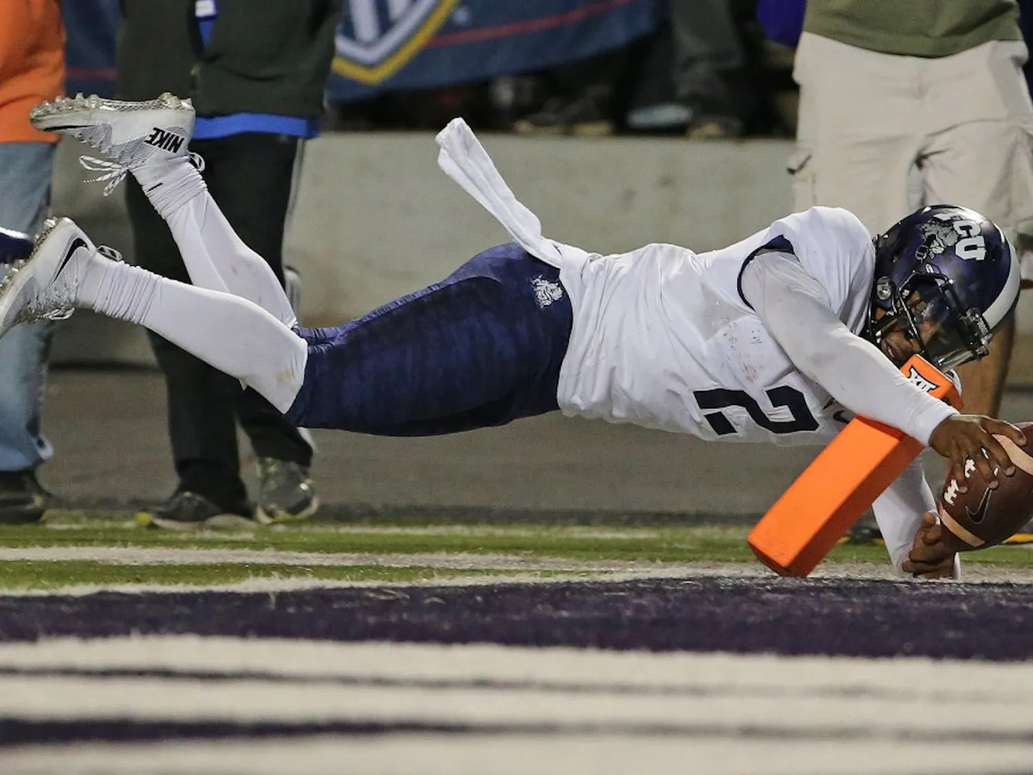 TCU quarterback Trevone Boykin (2) dives into the Kansas State end zone with a touchdown on a 14-yard run in the fourth quarter at Snyder Family Stadium in Manhattan, Kan., on Saturday, Oct. 10, 2015. TCU won, 52-45. (Paul Moseley/Fort Worth Star-Telegram/TNS)