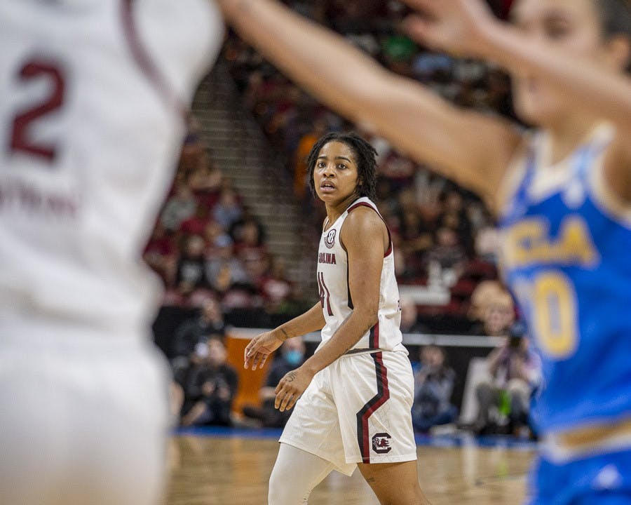 Freshman guard Talaysia Cooper watches the play during the match against UCLA at Bon Secours Wellness Arena in Greenville, South Carolina, on March 25, 2023. The Gamecocks beat the Bruins 59-43 and will move on to the Elite Eight tournament.