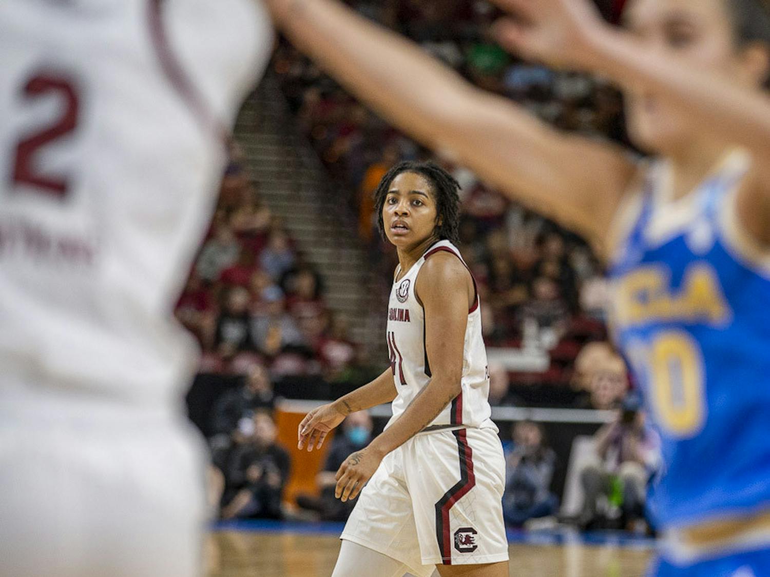 Freshman guard Talaysia Cooper watches the play during the match against UCLA at Bon Secours Wellness Arena in Greenville, South Carolina, on March 25, 2023. The Gamecocks beat the Bruins 59-43 and will move on to the Elite Eight tournament.
