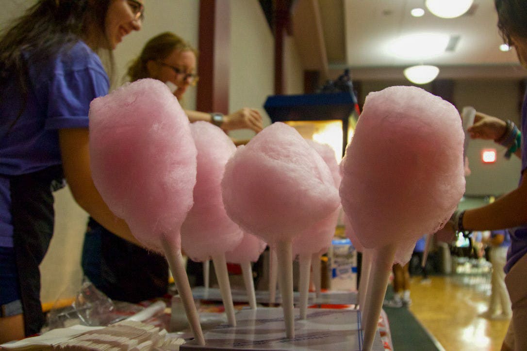 Attendees enjoyed cotton candy and popcorn courtesy of the Carolina Productions club during the Cirque de USC event on Sept. 20, 2022. Carolina Productions hosts a carnival themed event showcasing live acts and carnival food in a circus themed night which served as a unique spectacle for USC students and attendees.