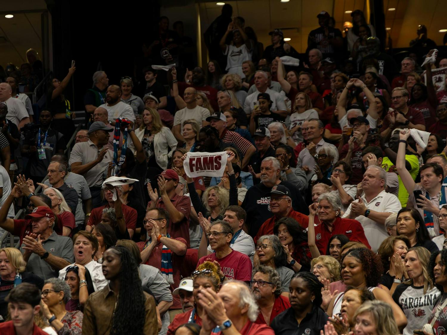 A University of South Carolina fan holds up a "FAMS" rally towel during South Carolina's game against Texas in the Final Four on April 4, 2025. The Gamecocks defeated the Longhorns 74-57.