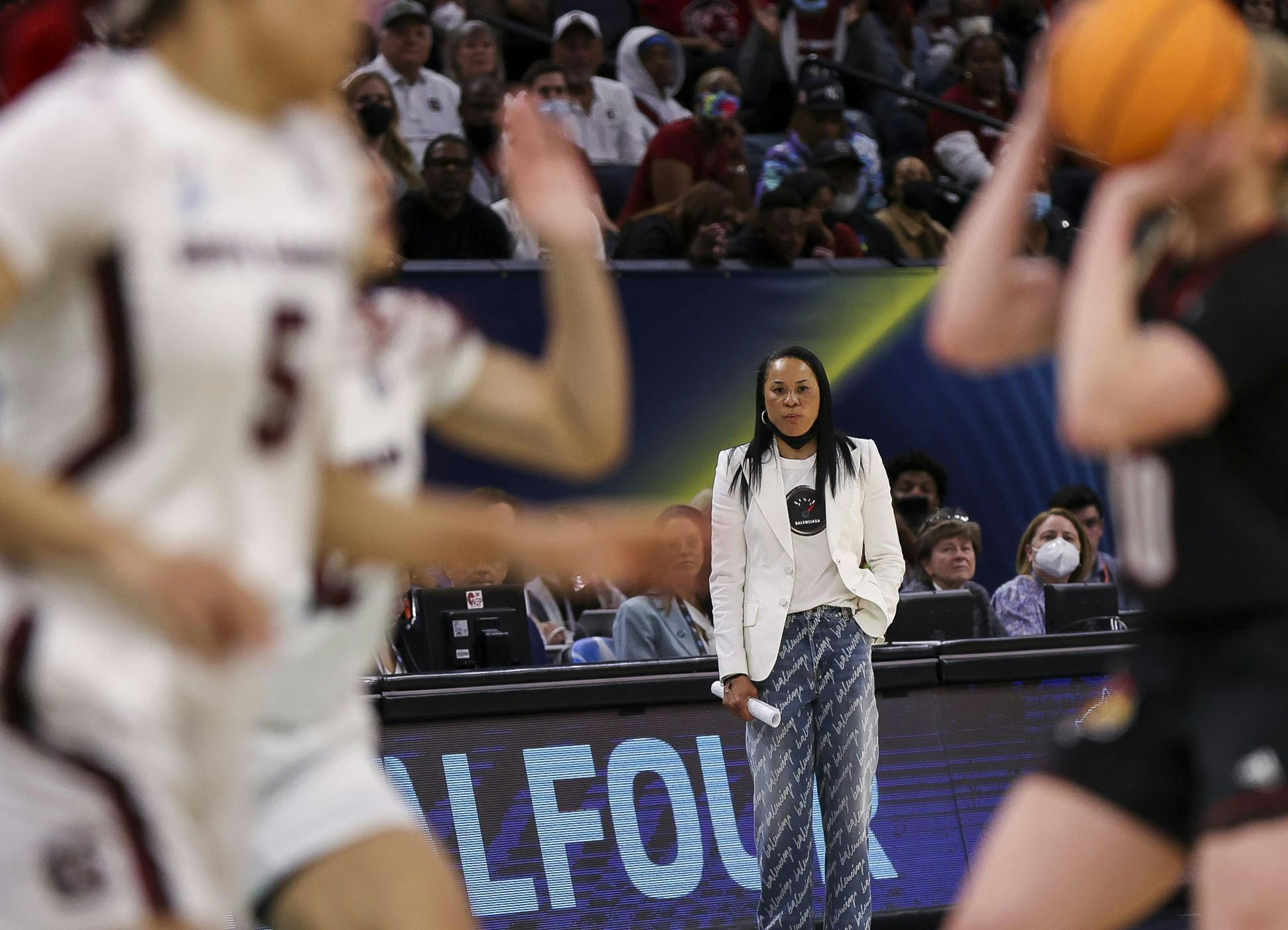 Head Coach Dawn Staley watches the Gamecocks defense during the fourth quarter of South Carolina's 72-59 victory over Louisville on April 1, 2022, advancing to the National Championship game.